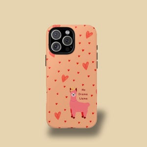 May include: A pink phone case with a pink llama wearing a crown and the text "No Drama Llama" on a peach background with red hearts.