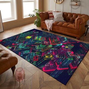 May include: A colourful abstract rug with a geometric pattern of neon pink, green, and blue lines on a dark blue background. The rug is laid out on a hardwood floor in a living room setting.