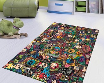 May include: A colorful rug with a pattern of cartoon faces and doodles. The rug is on a white floor in a room with green walls and white furniture.