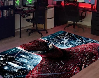 May include: A red and blue Spider-Man rug with a city skyline and web design. The rug features a close-up of Spider-Man's face.