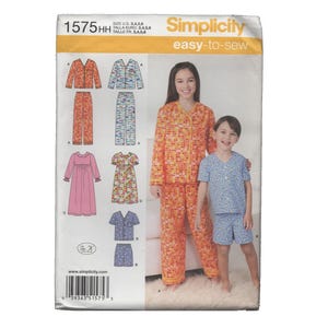 May include: Simplicity easy-to-sew pattern 1575HH. The pattern includes options for pajamas, a dress, and a skirt and top set. The cover features two children wearing pajama sets. The pattern is for sizes 3, 4, 5, and 6.
