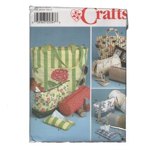 May include: A craft pattern sheet featuring various fabric bag designs. The bags include a tote with green and yellow stripes, a floral print pouch, a cylindrical case, and a tissue box cover. The word "Crafts" is at the top.