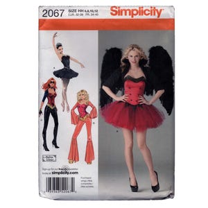 May include: Simplicity sewing pattern 2067 featuring costume designs. The cover shows a woman in a red and black devil costume with feathered wings, and other costume illustrations. Size HH 6,8,10,12.