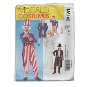 May include: A vintage McCall's Costumes sewing pattern, featuring illustrations of Uncle Sam, the Statue of Liberty, and other patriotic figures. The pattern includes sizes 8-10. The packaging is yellow and white with the text "McCall's Costumes".