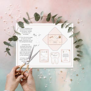 May include: Printable tooth fairy kit with a pink and gold design. The kit includes a tooth certificate, a letter from the tooth fairy, and an envelope. The instructions are printed on the page.