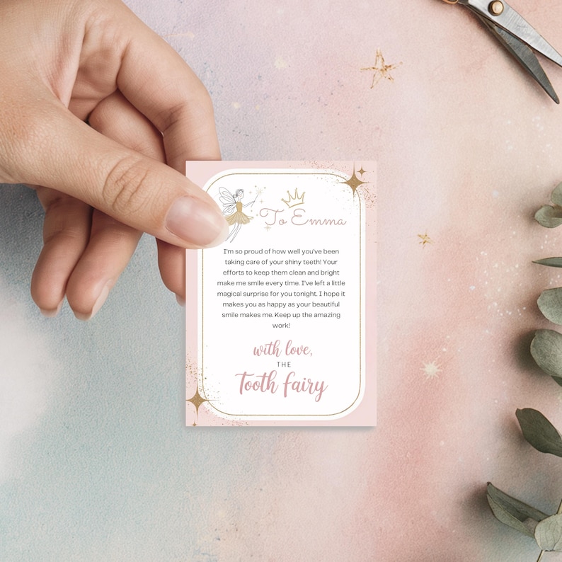May include: A pink and gold card with a fairy illustration and the text "To Emma" and "with love, THE Tooth fairy".