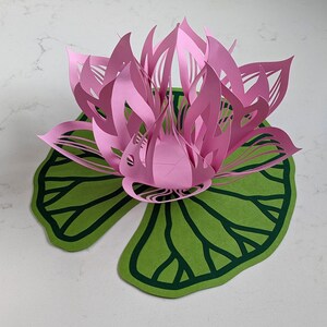 Pink paper lotus lantern with green lily pad base, flower light decor for table centerpiece
