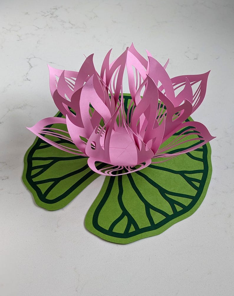 Pink paper lotus lantern with green lily pad base, flower light decor for table centerpiece