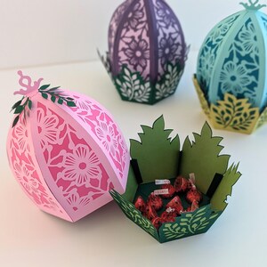 Easter egg with treats inside. Egg opens up to reveal a leaf basket of chocolates. Great for easter gifts.