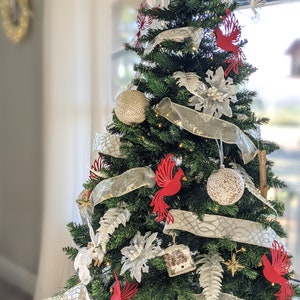 Christmas tree decorated with paper cardinals, christmas ornaments