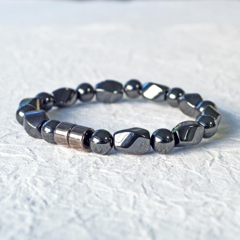 Magnetic bracelet for men handcrafted with high power black hematite magnetic beads. Bracelet is secured with a strong and easy-to-use magnetic clasp.