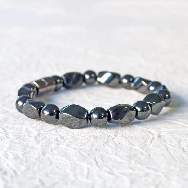 Magnetic bracelet for men handcrafted with high power black hematite magnetic beads. Bracelet is secured with a strong and easy-to-use magnetic clasp.