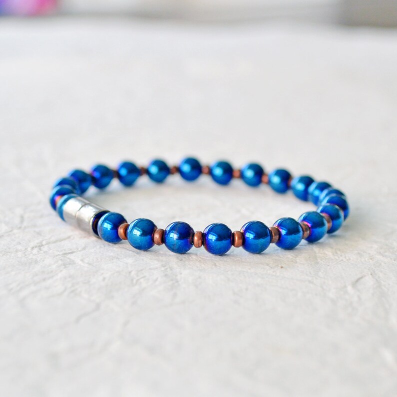 Magnetic bracelet handcrafted with blue metallic magnetic hematite beads. It is secured with a strong and easy-to-use rare earth magnetic clasp. Wear as a magnetic bracelet or magnetic ankle bracelet.