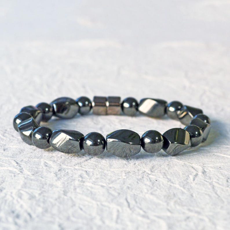 Magnetic bracelet for men handcrafted with high power black hematite magnetic beads. Bracelet is secured with a strong and easy-to-use magnetic clasp.