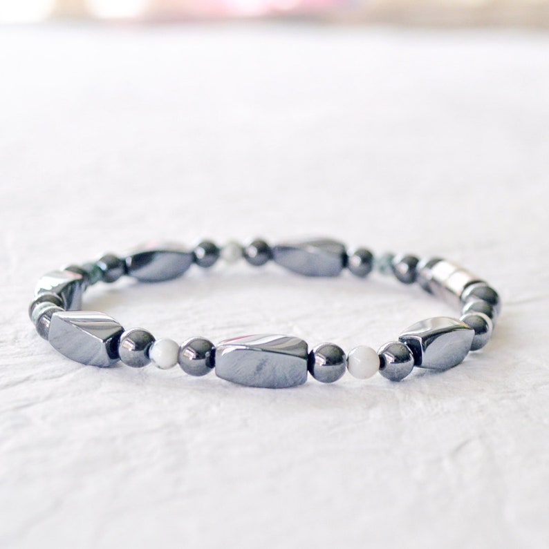 Magnetic bracelet handcrafted with black high power magnetic hematite beads and tree agate gemstone beads. Secured with a strong magnetic clasp. Wear as a magnetic bracelet or magnetic ankle bracelet.