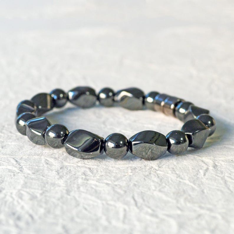 Magnetic bracelet for men handcrafted with high power black hematite magnetic beads. Bracelet is secured with a strong and easy-to-use magnetic clasp.