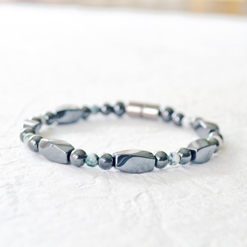 Magnetic bracelet handcrafted with black high power magnetic hematite beads and tree agate gemstone beads. Secured with a strong magnetic clasp. Wear as a magnetic bracelet or magnetic ankle bracelet.