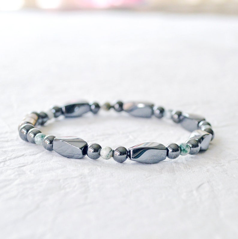 Magnetic bracelet handcrafted with black high power magnetic hematite beads and tree agate gemstone beads. Secured with a strong magnetic clasp. Wear as a magnetic bracelet or magnetic ankle bracelet.