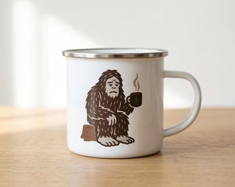 Sitting Sasquatch with Coffee Enamel Mug | Bigfoot Campfire Illustration