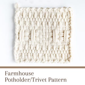 May include: A white farmhouse style crocheted pot holder or trivet. The pot holder is made with a woven pattern and has a square shape.