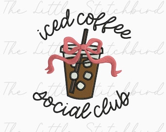 May include: An embroidered design featuring a brown iced coffee cup with ice cubes, a straw, and a pink bow. The words "iced coffee" and "social club" are written in black script above and below the cup, respectively.