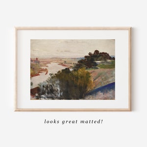 Puede incluir: Una pintura enmarcada de un paisaje con un r&iacute;o serpenteando a trav&eacute;s de un campo. El cielo es de un azul p&aacute;lido con nubes tenues. Los &aacute;rboles son de un verde oscuro y el campo es de un verde claro. El r&iacute;o es de un azul claro y el agua refleja el cielo.