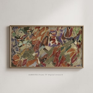 May include: Abstract painting in a gold frame. The artwork uses a palette of red, orange, green, and purple. The text "SAMSUNG Frame TV Digital Artwork" is visible at the bottom of the frame.