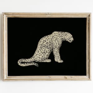May include: A black and white illustration of a leopard sitting on a black background. The leopard is facing to the right and has a spotted pattern.