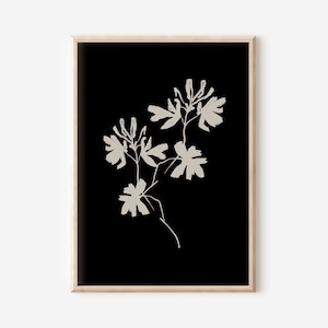 May include: A black and white minimalist art print featuring a stylized floral design with beige flowers and stems on a black background.