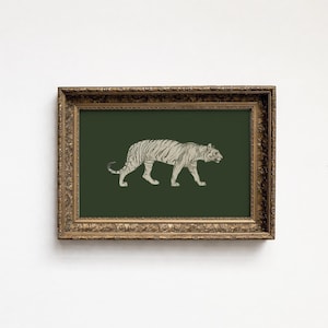 May include: A rectangular wall art piece featuring a light grey line drawing of a tiger in profile on a solid dark forest green background, encased in an ornate, antique-style gold-toned frame with intricate carved detailing along the edges.