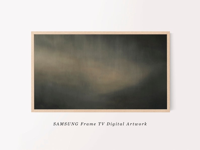 May include: A framed abstract painting with a dark green and brown color scheme. The painting features a soft, blurred effect, creating a sense of depth and movement. The frame is a simple, light wood.