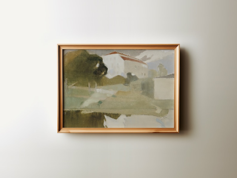 May include: A framed painting depicting a landscape with a white building with a red roof, green trees, and a body of water in the foreground. The painting is done in a muted color palette with shades of green, brown, and blue.