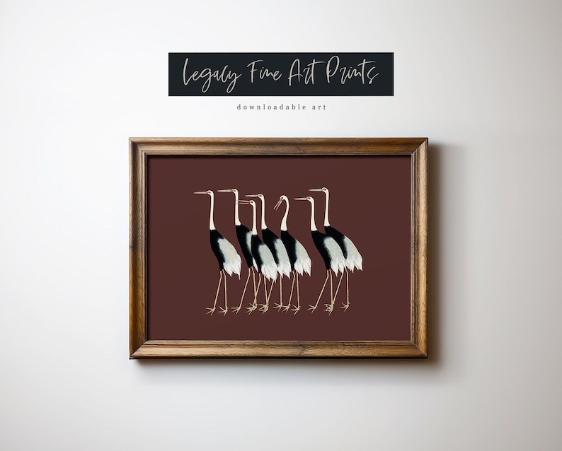 May include: A framed print of a group of seven black and white cranes with red beaks standing in a line on a maroon background. The print is titled "Legally Fine Art Prints downloadable art".