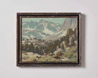 May include: A framed painting depicting a mountain landscape with snow-capped peaks and a group of people on horseback riding through a valley. The painting is set in a rustic, outdoor setting with a sense of adventure and exploration.