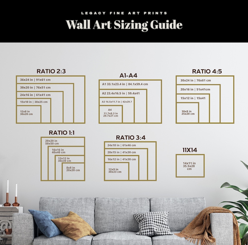 May include: A wall art sizing guide with different ratios and sizes in inches and centimeters. The guide includes ratios like 2:3, 1:1, 3:4, 4:5, and 11x14. The guide is displayed on a white wall with a brown couch in the foreground.