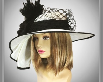 Kentucky Derby hat, "Sonya", beautiful Black and White straw hat with draped pleating, and large black flower, veiling, and feathers