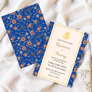 May include: Wedding invitation with a blue floral pattern and gold accents. The invitation includes the names Roxanne and Tommy, along with the wedding date and time. The invitation is on a white background.
