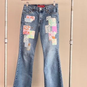 Reworked Vintage Jeans Redone Patched Stitched Pink Purple Flowers Dot