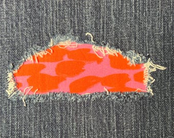 Parche termoadhesivo para mezclilla: Reparación casera en rosa fuerte y naranja