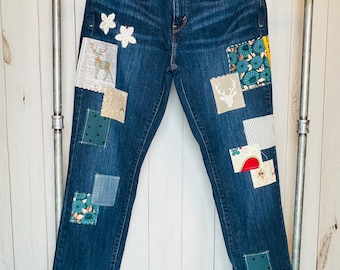 Geüpcycled Levi's 505-jeans: boho-denim met patch, maat 12