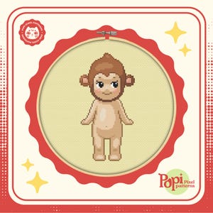 May include: A pixel art cross stitch pattern of a cartoon monkey in a hoop. The monkey is brown and beige with a light yellow background. The pattern is from "Popi Pixel Patterns".