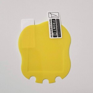 May include: A yellow screen protector with a unique shape. The protector has the text "FRONT 2" and instructions to peel off the mask with a sticker. The screen protector is designed to protect a device's screen.