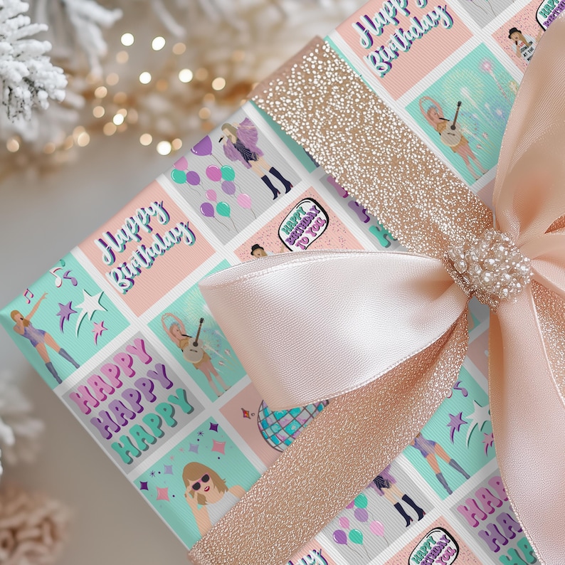 May include: A wrapped gift with a light pink satin bow and a sparkly gold ribbon. The wrapping paper has a repeating pattern of illustrations and the words "Happy Birthday" in a colorful, playful font.