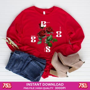 May include: A red long-sleeve shirt with a floral design featuring red roses and the letters R, S, and 8. The words "elegant", "respect", "superb", and "obvious" are also present. The image includes blue jeans and beige ankle boots.
