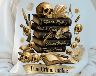 May include: A white sweatshirt with a gold and black design featuring a stack of books with titles such as "Murder Mystery", "Trial & Error", "Serial Killers", "Criminal Profiling", and "True Crime". The design also includes skulls, a gun, and a noose. The text "True Crime Junkie" is printed below the design.
