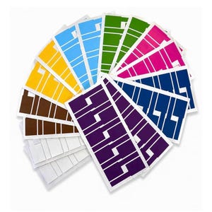 May include: A collection of colourful labels in shades of yellow, blue, green, pink, and purple. Each label has a white geometric design. The labels are arranged in a circular pattern against a white background.
