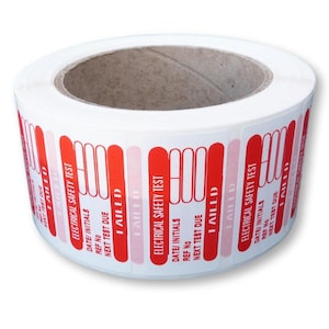 May include: Roll of red and white electrical safety test labels with the text "I FAILED" printed on each label. The labels have spaces for the date, initials, reference number, and next test due date.