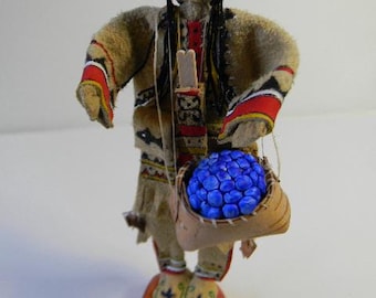Mi'Kmaq Woman, "Spirit Doll," with "Blueberry Basket," Pre-contact, painted leather regalia, (1)
