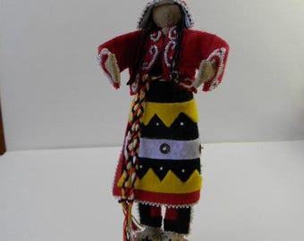 Mi'Kmaq "Spirit Doll," woman, post contact; red jacket, beaded wool regalia. (2)