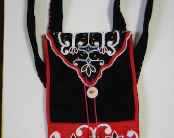 Mi'Kmaq beaded black and red wool shoulder bag; brass cones, glass and brass beads